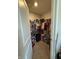 Walk-in closet with ample shelving and clothing racks, provides organization space at 10950 N Heirloom Dr, Monrovia, IN 46157