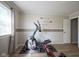 Exercise room featuring equipment and natural light from the bright window at 11458 Falling Water Way, Fishers, IN 46037