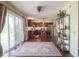 Bright kitchen with stainless steel appliances, center island, and hardwood floors at 11458 Falling Water Way, Fishers, IN 46037