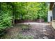 Backyard with privacy fence and hardscape features at 12348 Seaway Cir, Indianapolis, IN 46236
