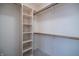 Walk-in closet with built-in shelving and hanging rods for ample storage at 12348 Seaway Cir, Indianapolis, IN 46236