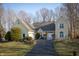 Charming yellow home with well-manicured lawn and inviting driveway at 12348 Seaway Cir, Indianapolis, IN 46236