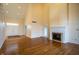 Spacious living room with fireplace and polished hardwood floors at 12348 Seaway Cir, Indianapolis, IN 46236