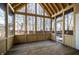 Charming screened porch with wood floors, vaulted ceiling, and views of the backyard at 12348 Seaway Cir, Indianapolis, IN 46236