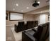 Basement theater room with projector, screen, and plush seating for ultimate entertainment at 12348 Seaway Cir, Indianapolis, IN 46236