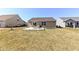 Backyard featuring a patio with a patio set and view of the home's siding at 1269 Frogs Leap, Cicero, IN 46034