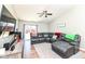 Comfortable living room with hardwood floors, ceiling fan, and a plush sectional sofa at 1269 Frogs Leap, Cicero, IN 46034