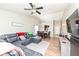 Open-concept living and dining area with high ceilings, hardwood floors, and lots of natural light at 1269 Frogs Leap, Cicero, IN 46034