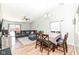 Spacious living room featuring vaulted ceilings, hardwood floors, and a sliding glass door at 1269 Frogs Leap, Cicero, IN 46034