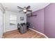 Office features a modern desk, sleek black chair, and wood-look floors at 1269 Frogs Leap, Cicero, IN 46034