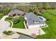 Aerial view of a home with a pool, manicured lawns, beautiful landscaping, and neighborhood at 1358 Rutherglen Ct, Danville, IN 46122