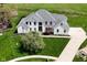 Aerial view of a beautiful home with lush green lawn and well-kept landscaping at 1358 Rutherglen Ct, Danville, IN 46122