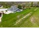 The expansive property features a pristine in-ground pool and meticulously maintained grounds at 1358 Rutherglen Ct, Danville, IN 46122