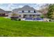 Home with an in-ground pool and large backyard space, perfect for entertaining and relaxation on sunny days at 1358 Rutherglen Ct, Danville, IN 46122