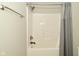 Bathroom featuring a shower with bronze fixtures and a white shower surround at 1358 Rutherglen Ct, Danville, IN 46122