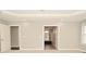 Bright bedroom offering neutral paint, recessed lights, and doorway to bathroom at 1358 Rutherglen Ct, Danville, IN 46122