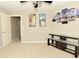 A light filled bedroom with neutral walls and carpet features a modern glass shelving unit at 1358 Rutherglen Ct, Danville, IN 46122