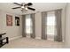 Well-lit bedroom with ceiling fan, carpeted floors and plenty of natural light at 1358 Rutherglen Ct, Danville, IN 46122