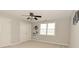 Cozy bedroom featuring natural light, carpeted floors, and standard closet at 1358 Rutherglen Ct, Danville, IN 46122