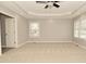 Bright, carpeted bedroom featuring recessed lighting and sun-filled windows at 1358 Rutherglen Ct, Danville, IN 46122