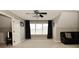 Bonus room with a large window and natural light, perfect for a living space or play area at 1358 Rutherglen Ct, Danville, IN 46122