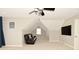 Cozy bonus room featuring a comfortable sofa and a sloped ceiling with natural light at 1358 Rutherglen Ct, Danville, IN 46122