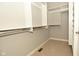 Spacious walk-in closet with ample shelving and rod space at 1358 Rutherglen Ct, Danville, IN 46122