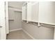 Bright closet featuring ample shelving, rod space, and carpeted floors at 1358 Rutherglen Ct, Danville, IN 46122