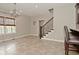 Bright dining area with tile floors and chandelier at 1358 Rutherglen Ct, Danville, IN 46122