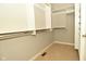 Spacious walk-in closet with custom shelving for optimal organization at 1358 Rutherglen Ct, Danville, IN 46122