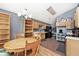 Eat-in kitchen featuring wooden cabinets, black appliances, tile floors and abundant natural light from above at 1378 Millridge Dr, Greenwood, IN 46143