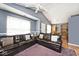 Spacious living room with vaulted ceilings, a comfy oversized sectional, and natural light from a window at 1378 Millridge Dr, Greenwood, IN 46143