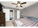 Cozy primary bedroom featuring a fan, dresser, closet, and neutral paint at 1378 Millridge Dr, Greenwood, IN 46143