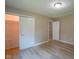 Bedroom with modern floors, closet, and neutral walls at 1509 E Centennial Ave, Muncie, IN 47303