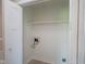 Inside laundry room offers convenience with a shelf and space for washer/dryer at 1509 E Centennial Ave, Muncie, IN 47303