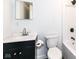 This bathroom is complete with updated vanity and shower at 1521 Lawton Ave, Indianapolis, IN 46203