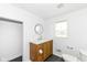 The bathroom features an attractive vanity, modern fixtures, and a well-lit space at 1521 Lawton Ave, Indianapolis, IN 46203