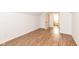 Bedroom with hardwood-style flooring and an ensuite bathroom at 1521 Lawton Ave, Indianapolis, IN 46203