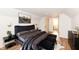 Main bedroom featuring a comfortable bed and contemporary decor at 1521 Lawton Ave, Indianapolis, IN 46203