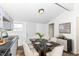 Charming dining area featuring table and chairs, and modern lighting at 1521 Lawton Ave, Indianapolis, IN 46203