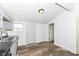 Kitchen features stainless appliances and neutral flooring at 1521 Lawton Ave, Indianapolis, IN 46203