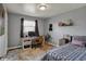 Cozy bedroom with desk area, carpet floors, and a window view at 15415 E 146Th St, Noblesville, IN 46060