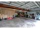 Large garage with tools, equipment, and space for projects or storage at 15415 E 146Th St, Noblesville, IN 46060