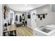 Well-organized mud room featuring coat racks, shoe storage, and convenient access to the outdoors at 15415 E 146Th St, Noblesville, IN 46060
