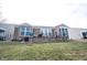 Well-maintained backyard with a stone patio and brick wall, providing a private and inviting outdoor area at 16164 Loire Valley Dr, Fishers, IN 46037