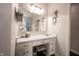 Bright bathroom vanity featuring ample lighting, countertop space, and storage drawers at 16164 Loire Valley Dr, Fishers, IN 46037