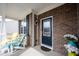Inviting front porch with comfortable seating and a stylish door adding warmth and character at 16164 Loire Valley Dr, Fishers, IN 46037
