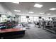 Spacious gym with state-of-the-art exercise equipment and ample natural light at 16164 Loire Valley Dr, Fishers, IN 46037