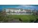 Outdoor pool area with lounge chairs and well-maintained landscaping at 16164 Loire Valley Dr, Fishers, IN 46037