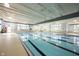 Indoor swimming pool with a bright and airy design and marked lanes at 16164 Loire Valley Dr, Fishers, IN 46037